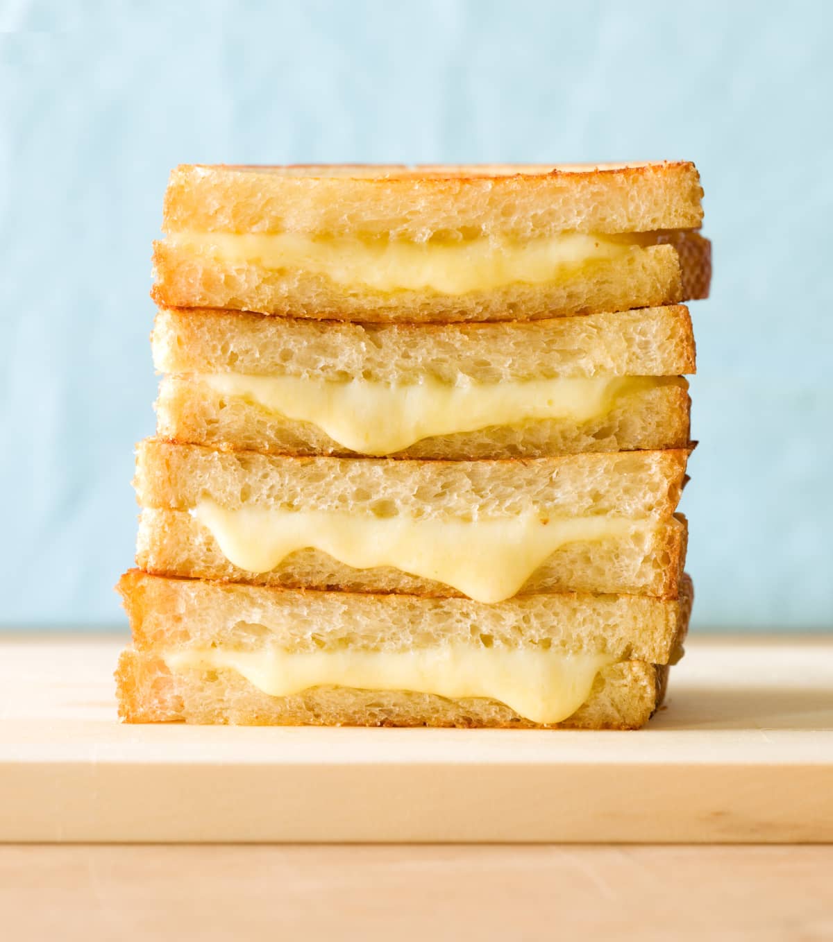 Grilled cheese sandwiches, stacked.