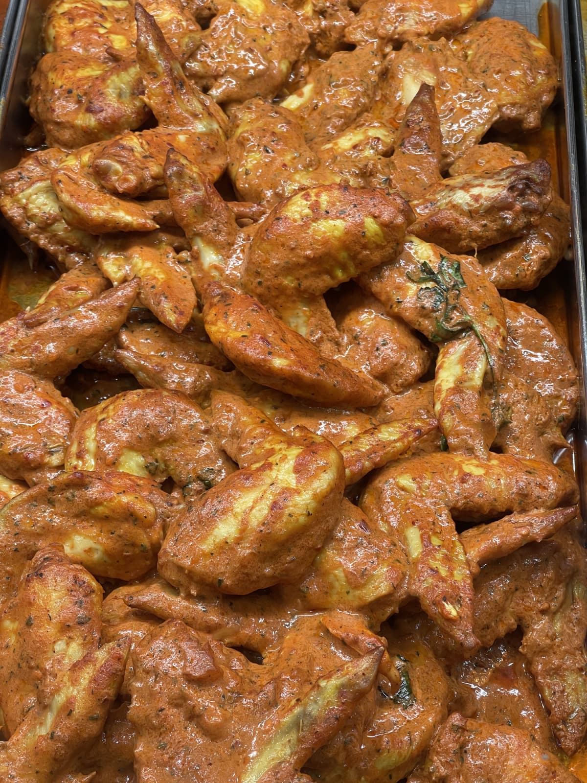 Marinated spicy chicken wings.