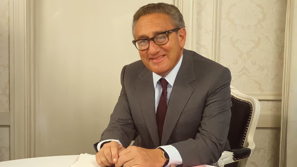 Henry Kissinger smiling