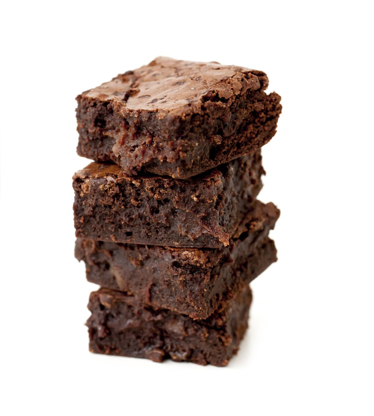 Stack of freshly baked homemade moist fudgy brownies with a cup of coffee