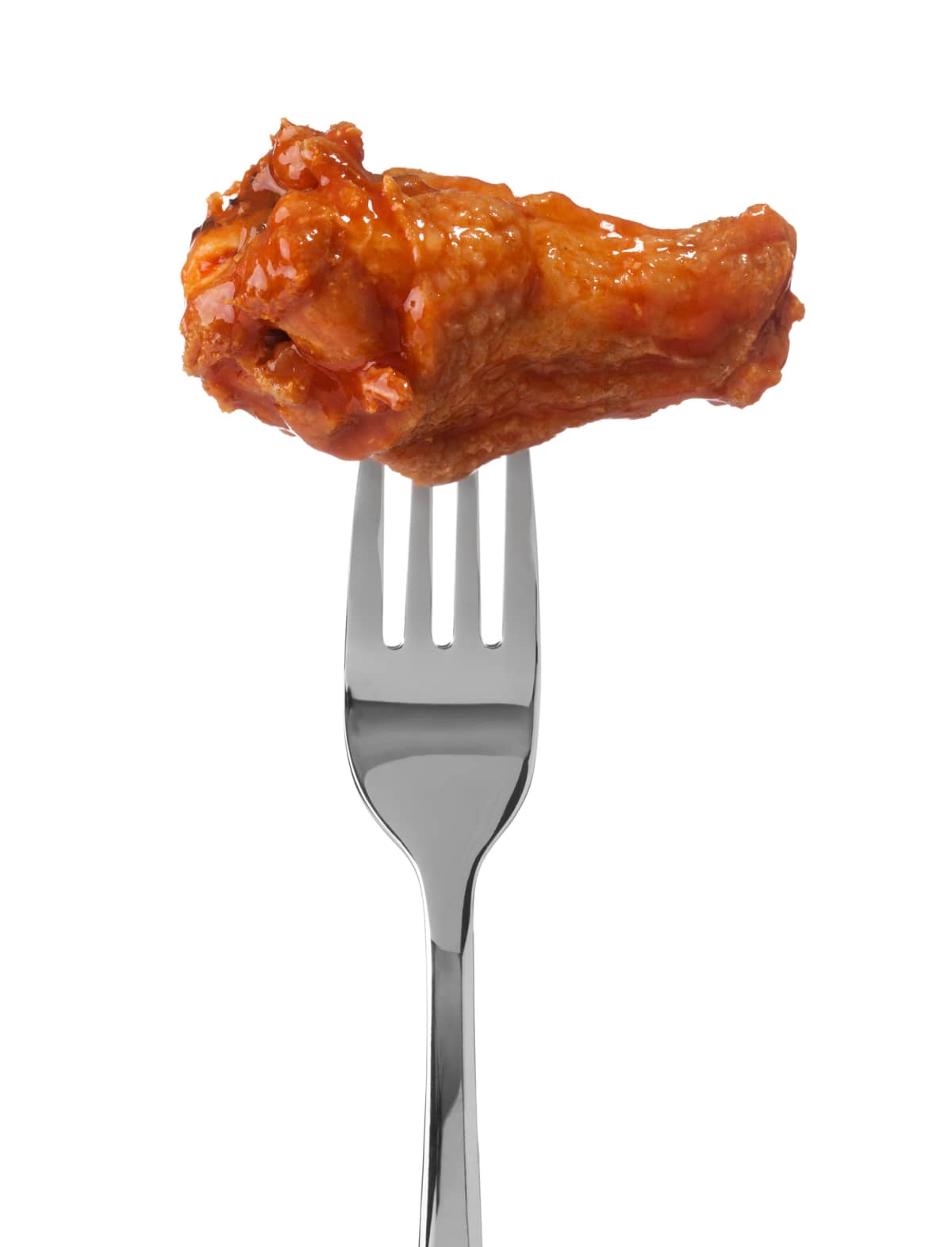Hot wing drumstick on fork on white background.  Please see my portfolio for other food and drink images.