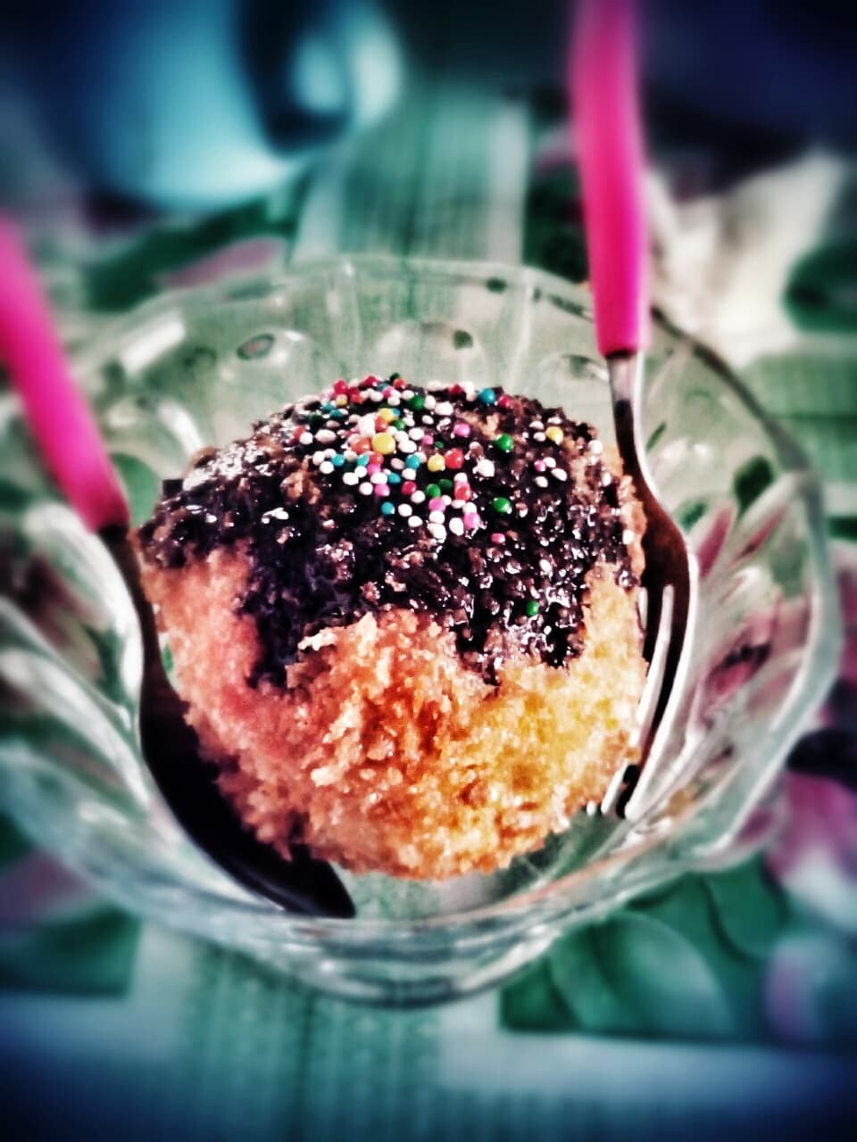 Fried ice cream with sprinkles in glass cup