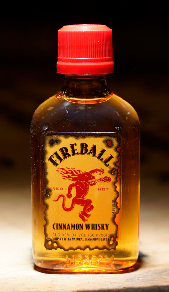 Fireball Cinnamon Whiskey bottle on dark background