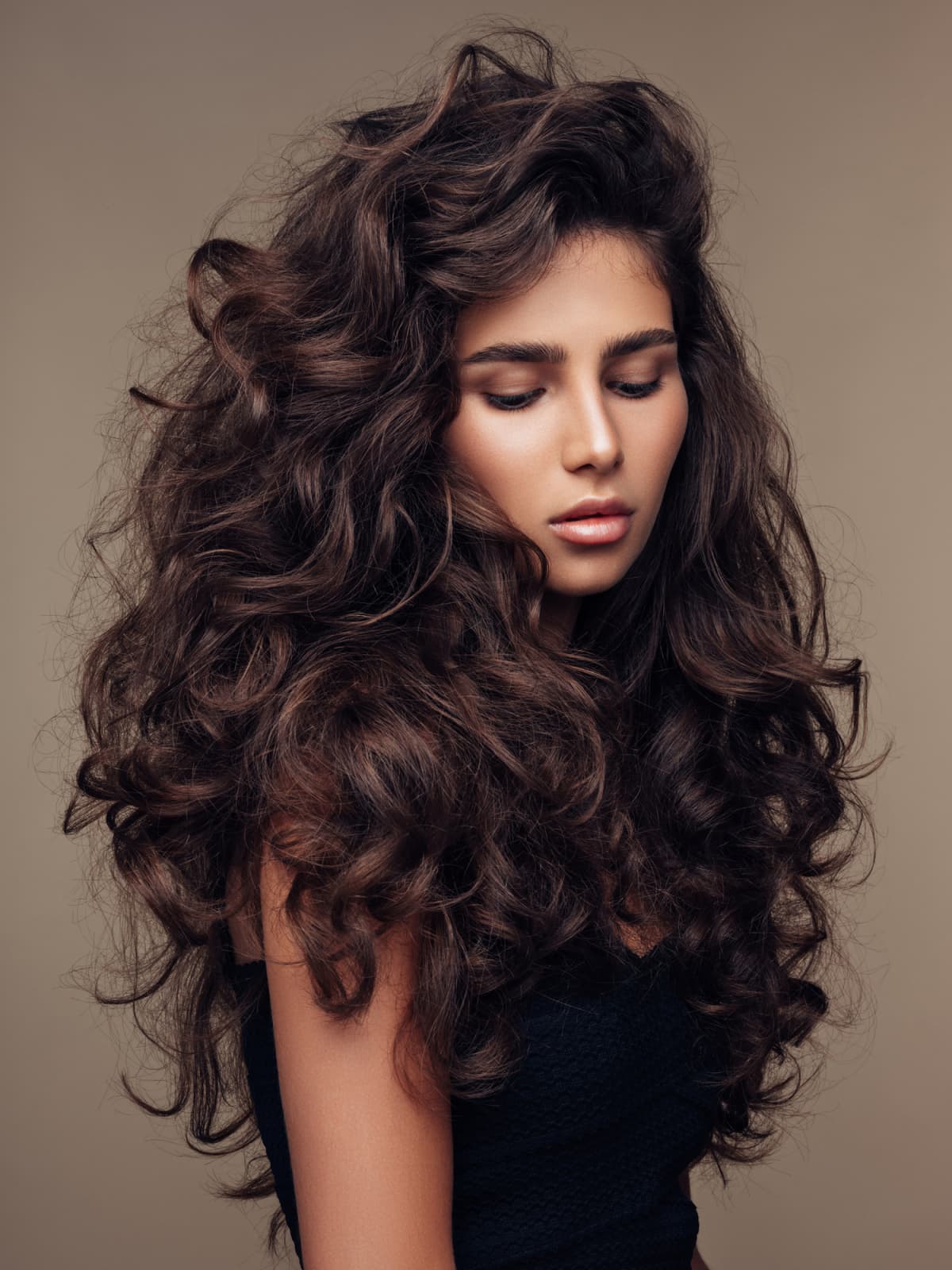 A woman with wavy hair.