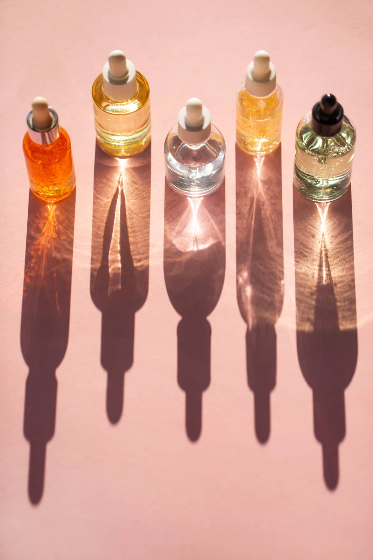 array of glass skincare bottles