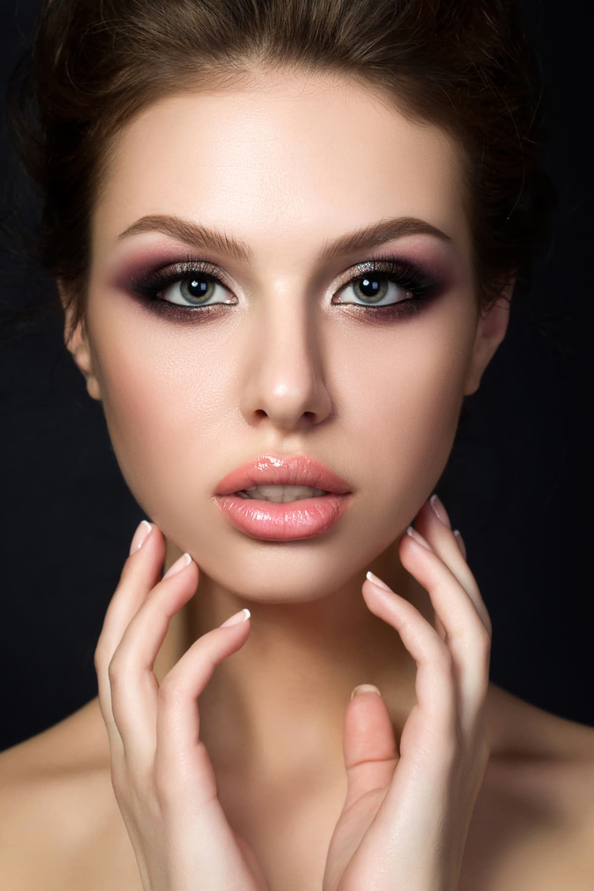 Close-up portrait of beautiful woman with cat eye make-up