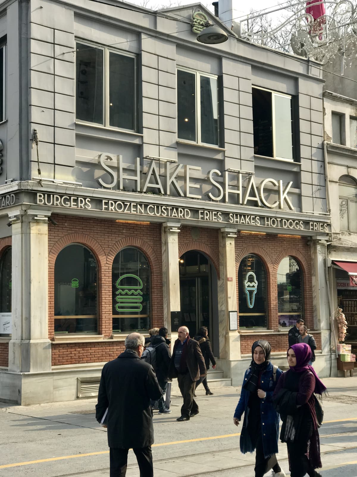 A general view of the restaurant Shake Shack in Washington, DC, December 30, 2014. The fast-food chain, started by celebrity restaurateur Danny Meyer, filed to go public on December 29, 2014. Backed by private equity firm Leonard Green & Partners, Shake Shack is a self-described modern day roadside burger stand whose vision is to stand for something good.       AFP PHOTO/JIM WATSON        (Photo credit should read JIM WATSON/AFP via Getty Images)