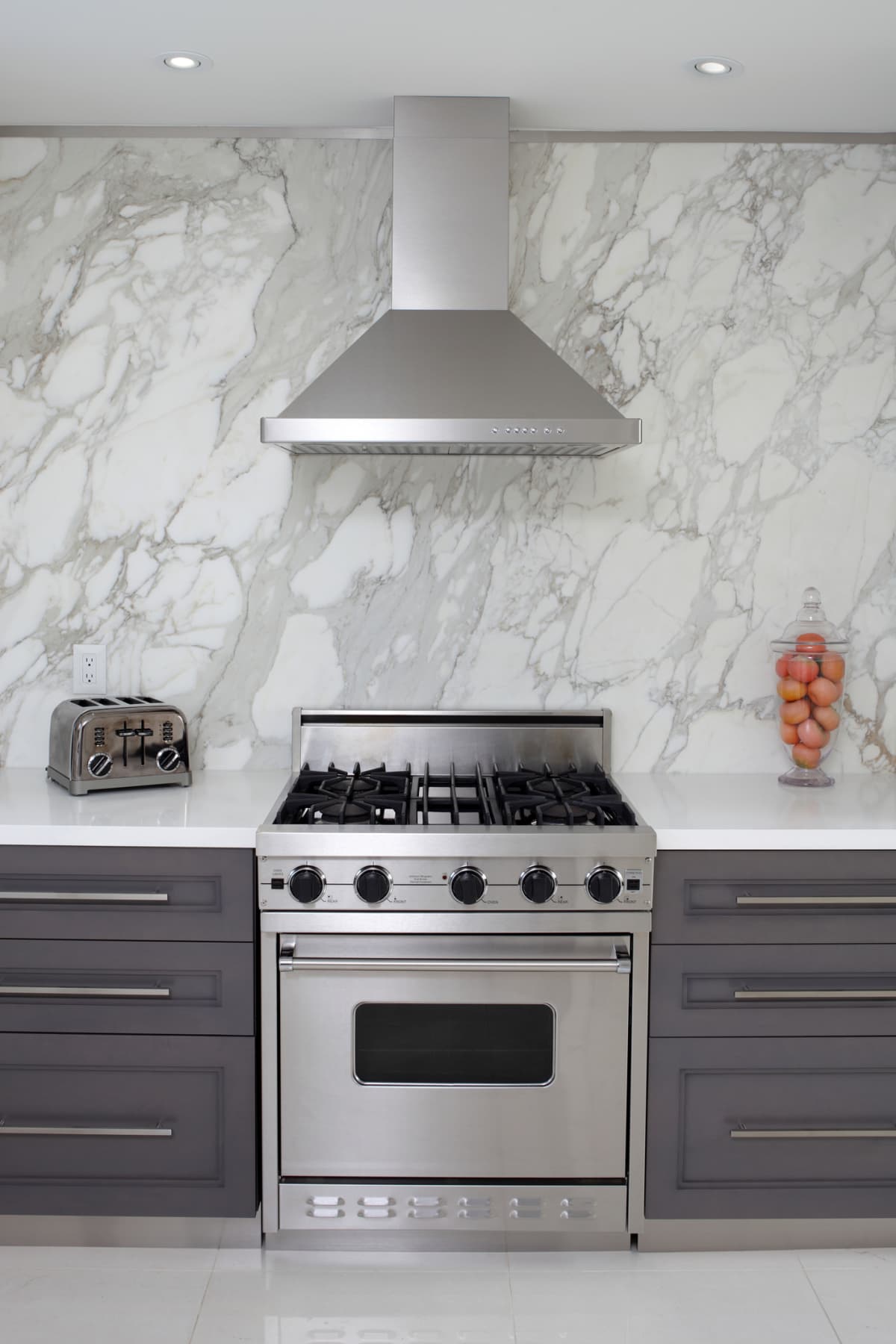 A luxury kitchen with a range hood