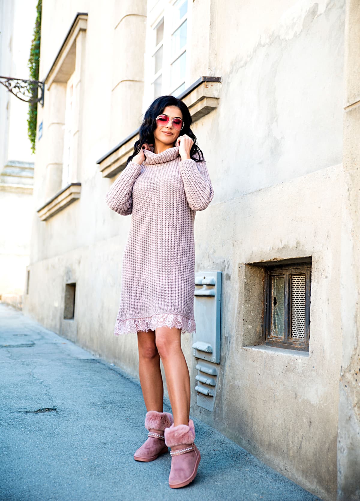 Woman wearing sweater dress and Uggs