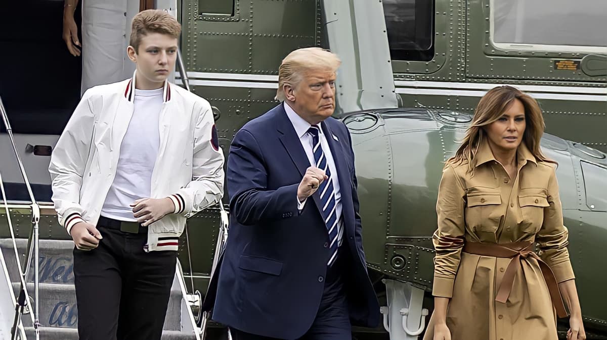 Barron Trump exiting an aircraft with his parents