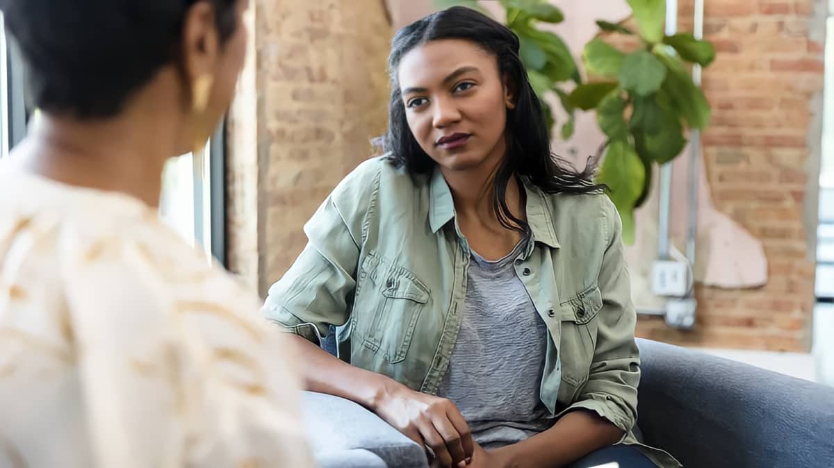 A woman looks at her therapist skeptically