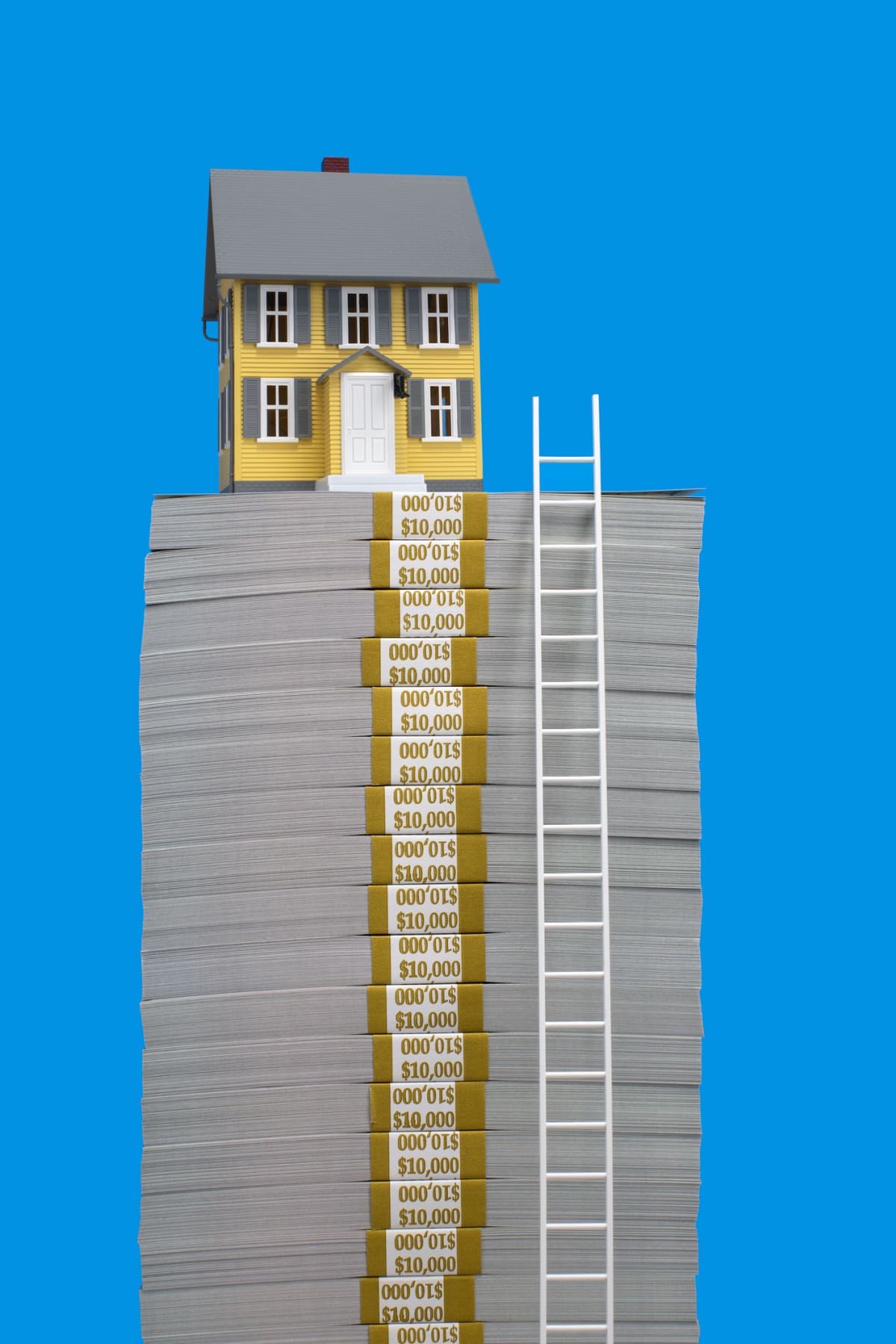 White ladder leading to model of yellow single family home on top of stack of $100 US bill bundles, blue background