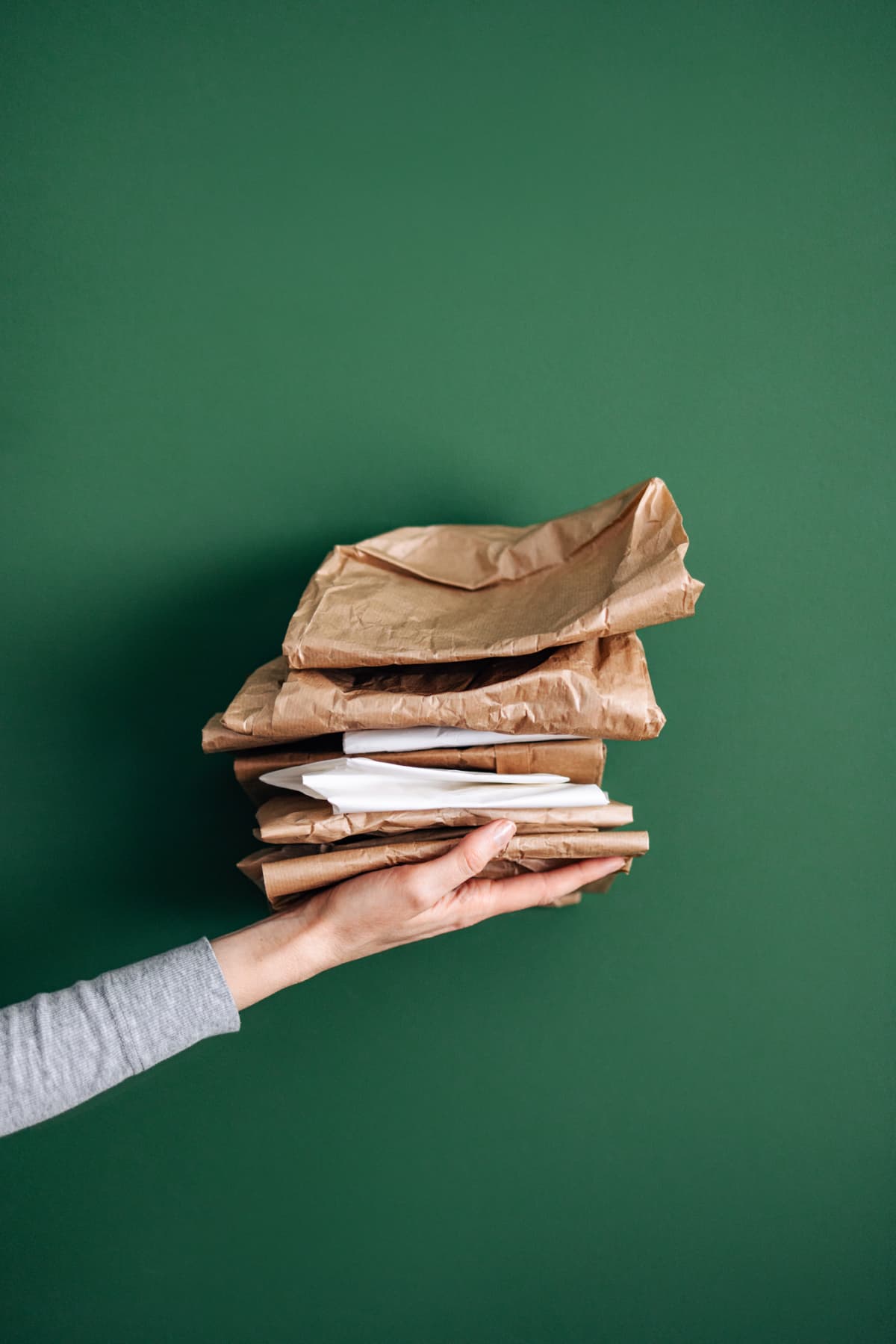 A person holding paper bags
