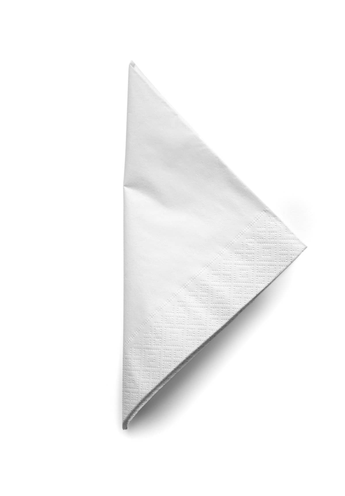 Folded cocktail napkin isolated on white background