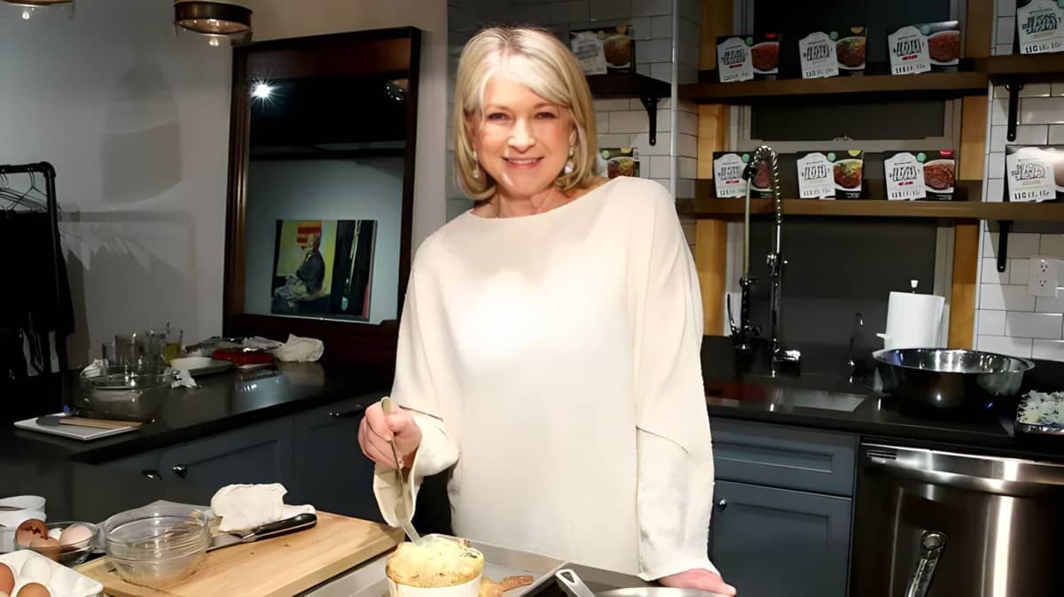 Martha Stewart smiling in a kitchen