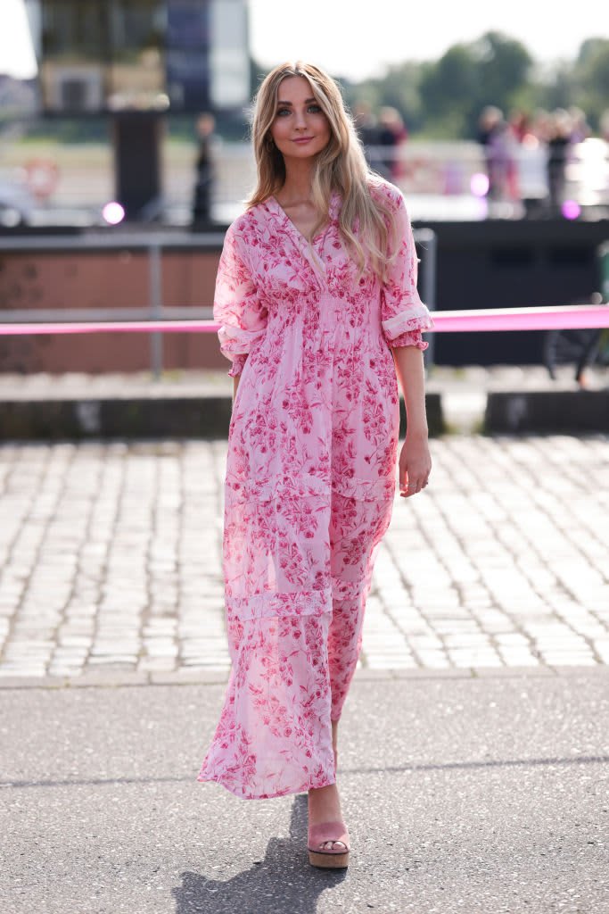 DUSSELDORF, GERMANY - JULY 23: Anna Hiltrop wearing a rose maxi dress from Riani and attends the Riani Fashion Festival on July 23, 2022 in Dusseldorf, Germany. (Photo by Jeremy Moeller/Getty Images for Riani)