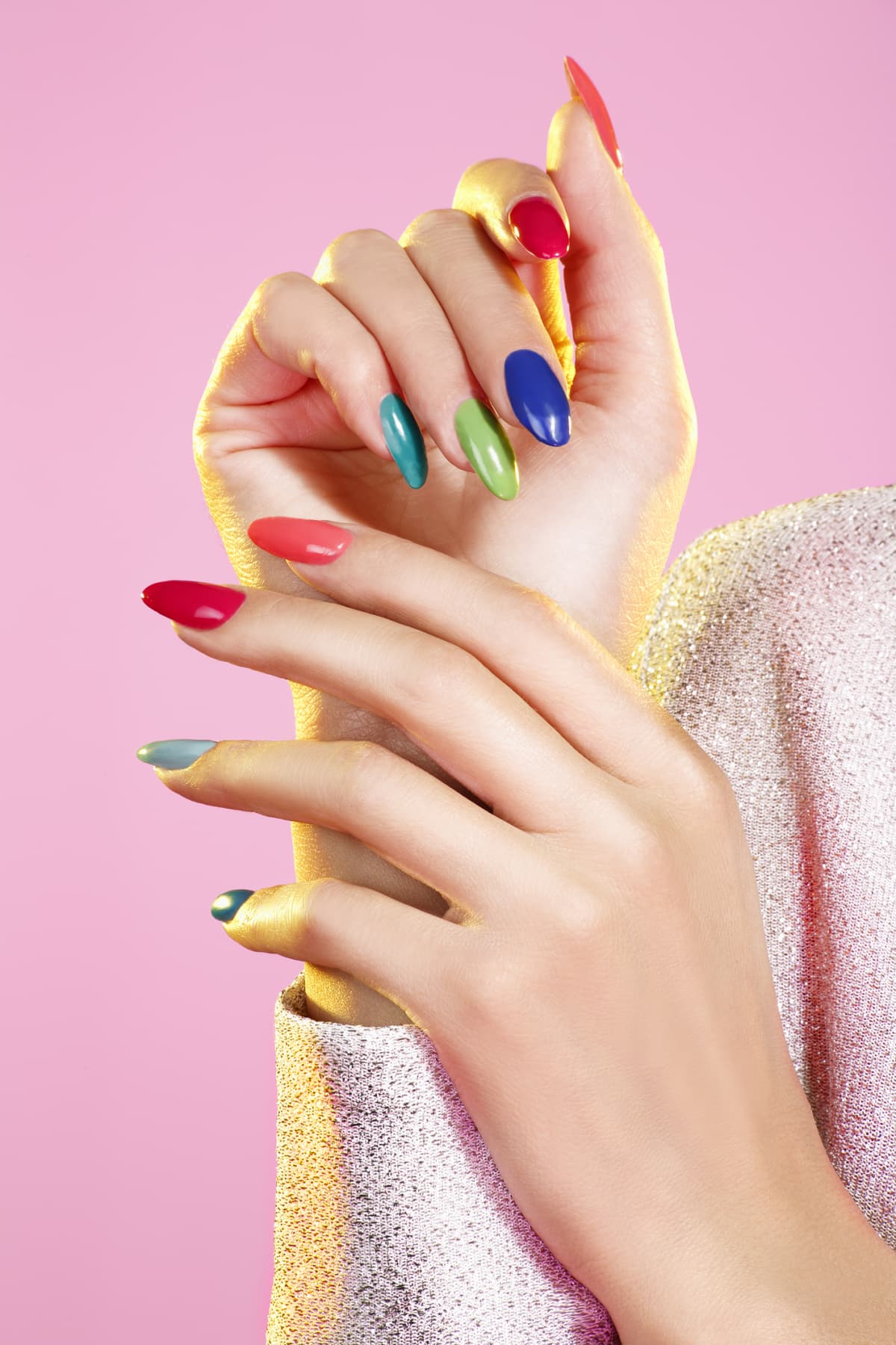 Female hand with colorful nail polish