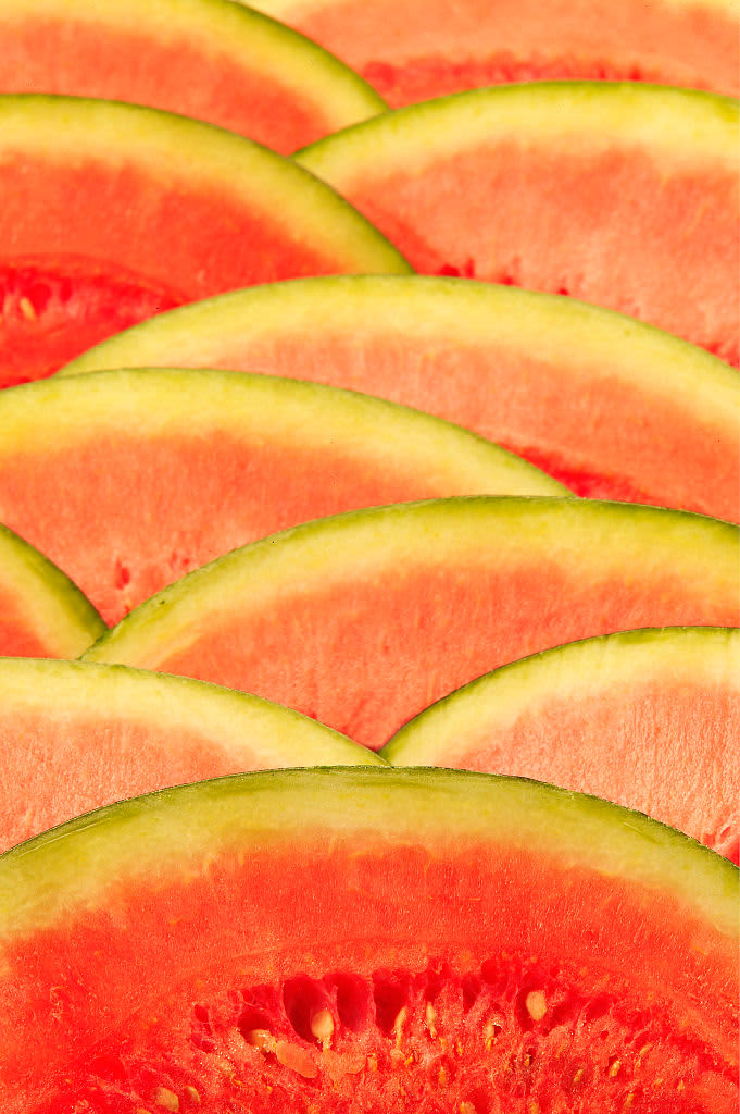 Layers of semicircular slices of watermelon