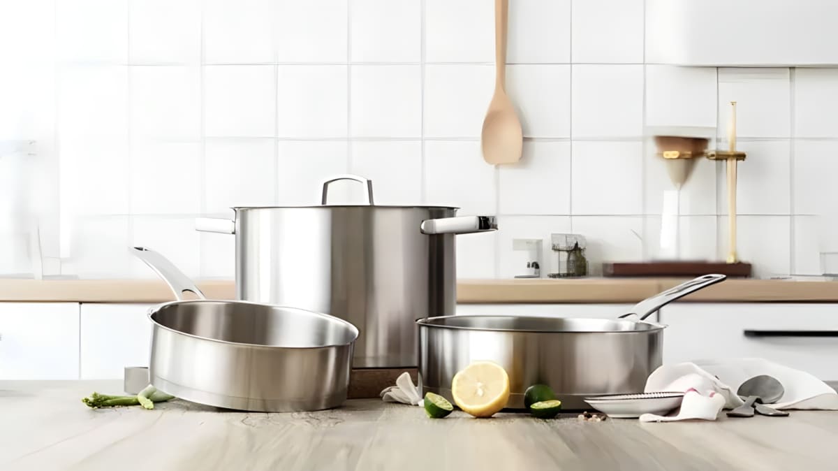 Steel pots and pans on the kitchen counter