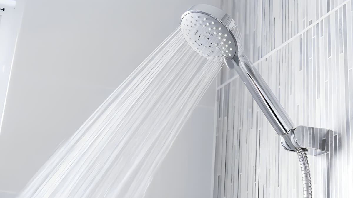 A shower head with water coming out