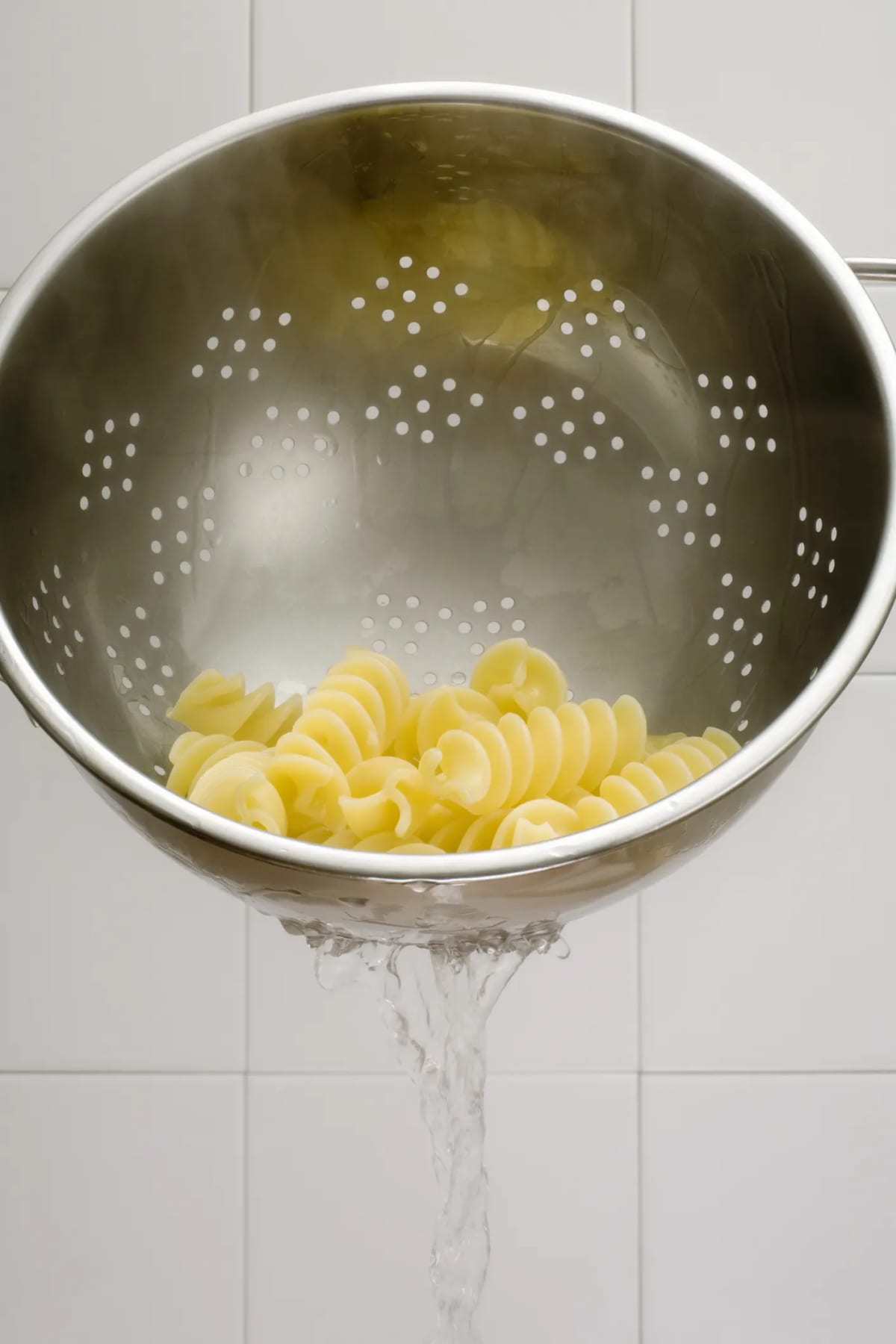 Pasta Water Being Strained
