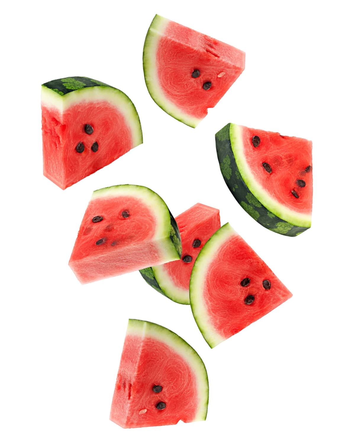Slices of watermelon against a white background
