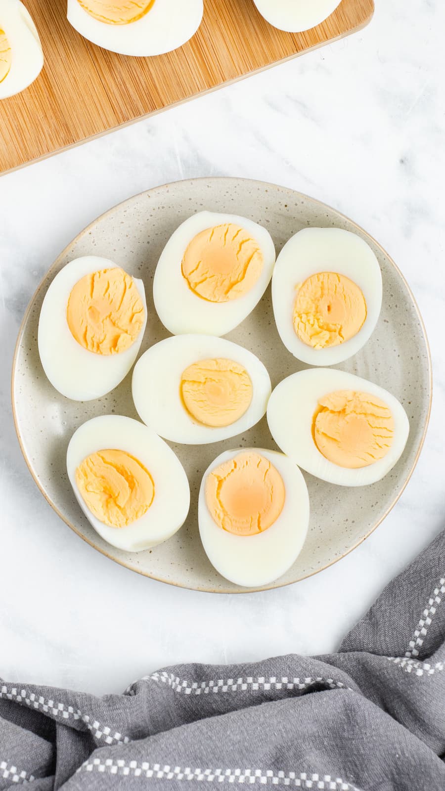 Hard boiled egg halves on plate