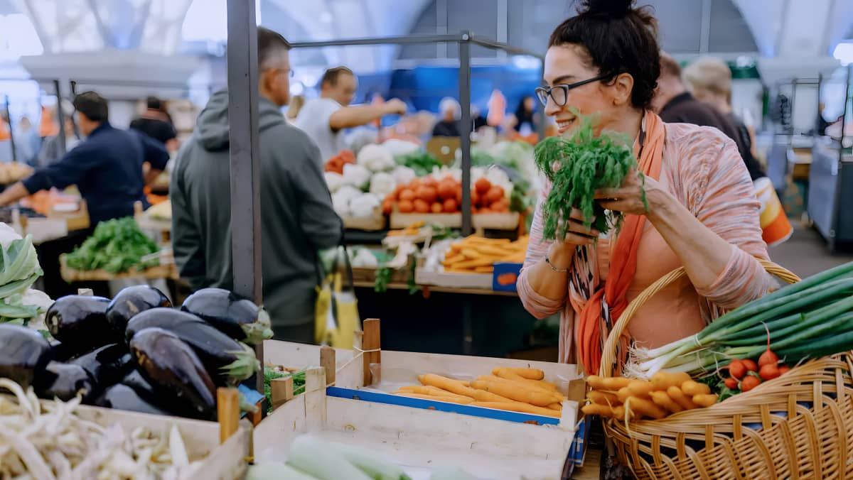 Person shopping at a farmers' market