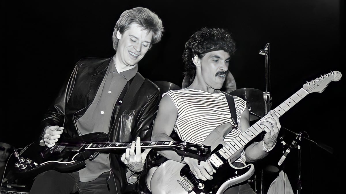 Daryl Hall and John Oates of Hall & Oates on stage, black and white