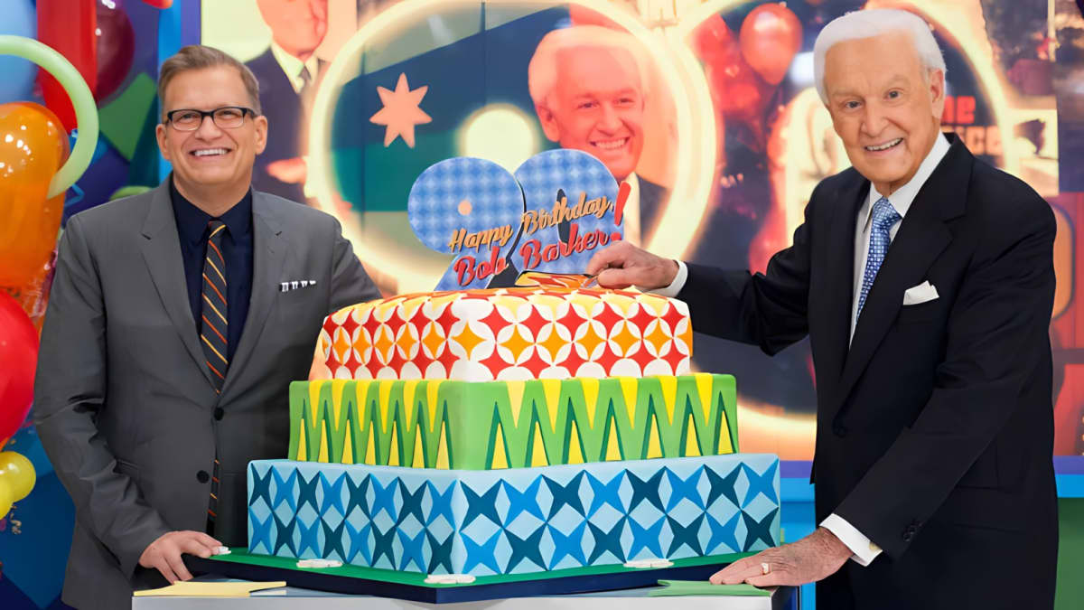 Bob Barker and Drew Carey smiling on The Price Is Right