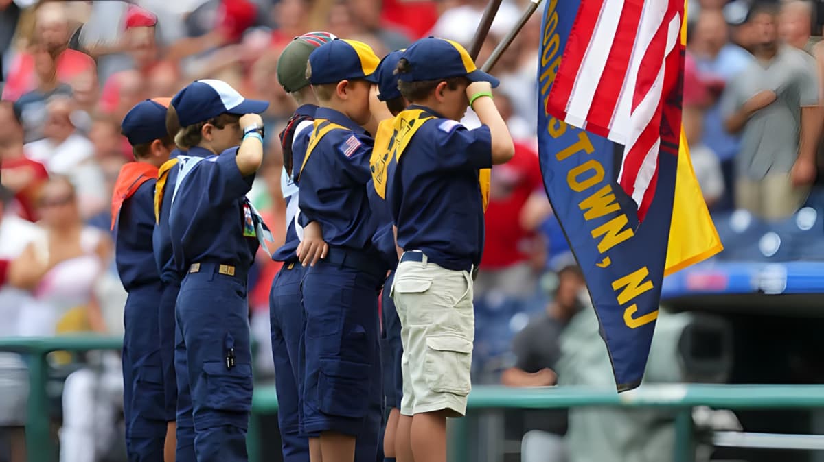 Cub Scout color guard saluting