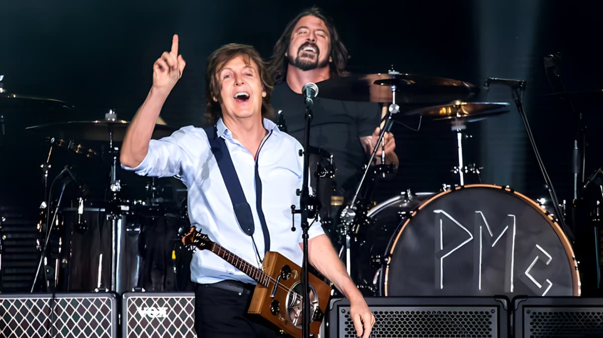 Dave Grohl and Paul McCartney performing on stage