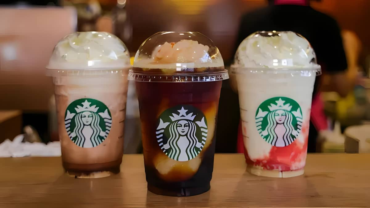 Starbucks drinks lined up.