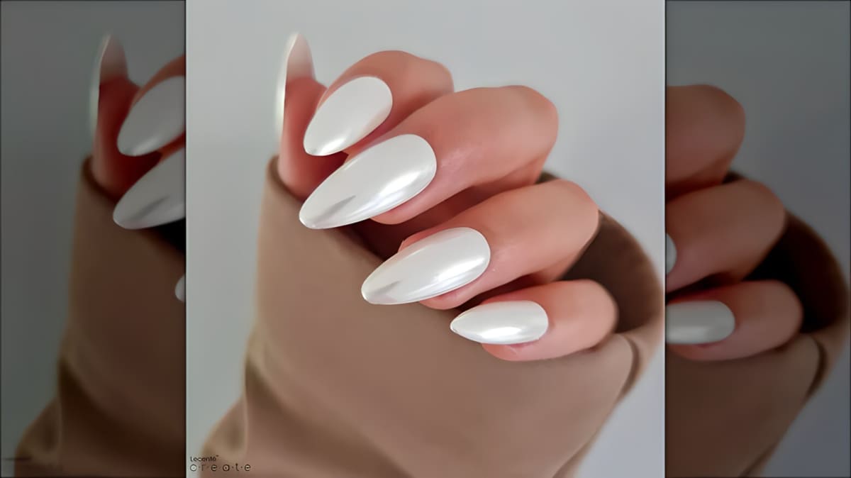 Long white chrome nails.