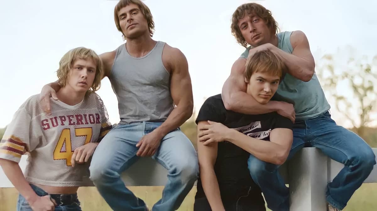 The cast of The Iron Claw including Zac Efron posing for the camera