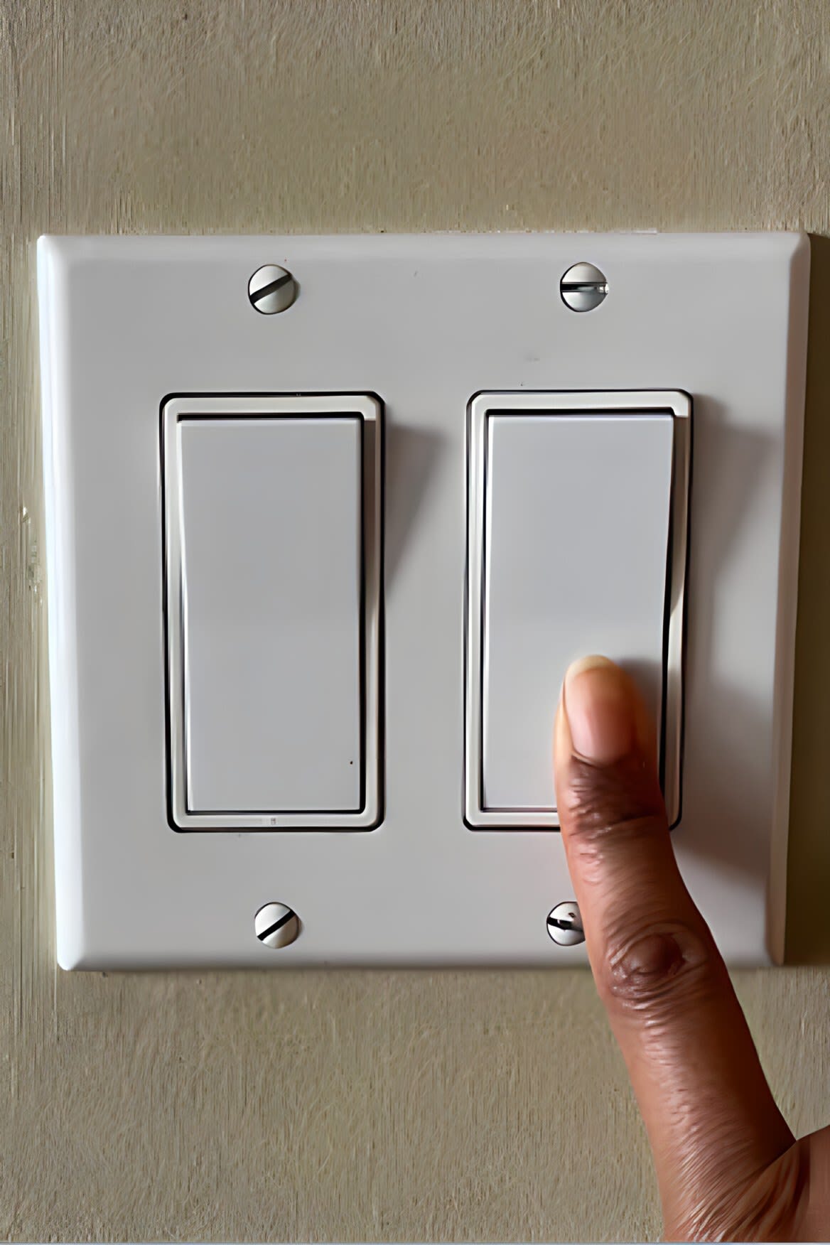 Close-up of plain light switch cover on wall